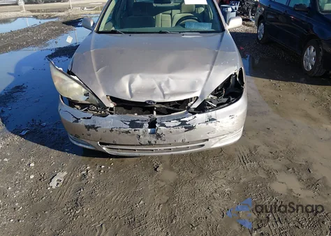 2003 Toyota Camry Le z USA, uszkodzony, nr VIN 4T1BE32K73U137925